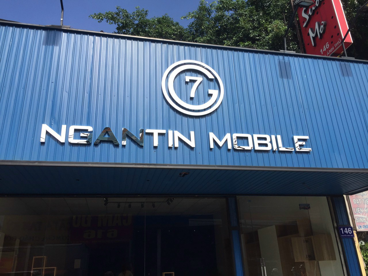 Bảng hiệu tôn sóng Ngân Tin Mobile